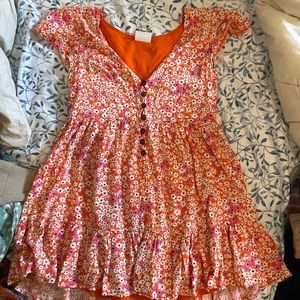 Small orange m, pink floral dress